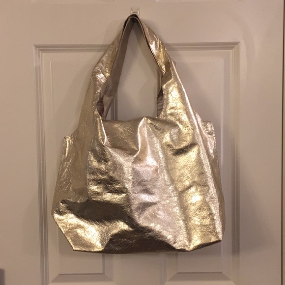 Stella and Dot gold switcharoo tote. - Picture 1 of 3